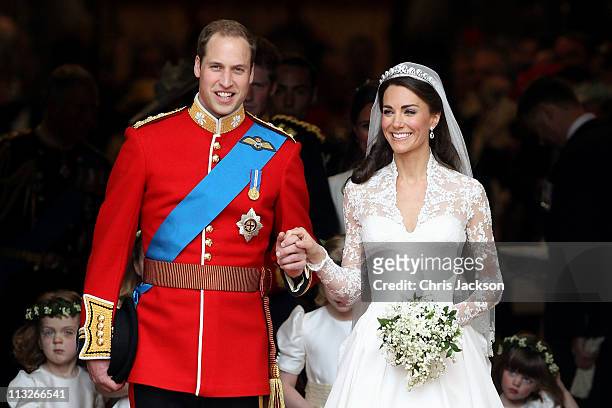 Prince William, Duke of Cambridge and Catherine, Duchess of Cambridge smile following their marriage at Westminster Abbey on April 29, 2011 in...