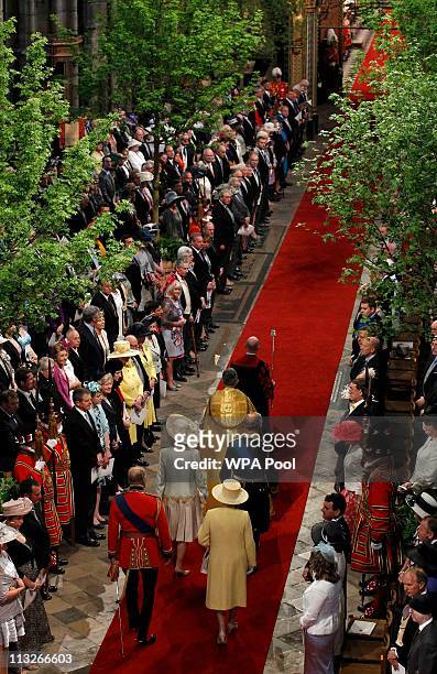 Camilla, Duchess of Cornwall and Prince Charles, Prince of Wales walk down the aisle followed by Prince Philip, Duke of Edinburgh and Queen Elizabeth...