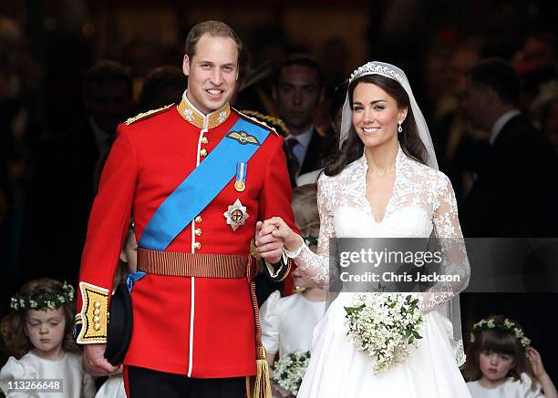 Prince William, Duke of Cambridge and Catherine, Duchess of Cambridge smile following their marriage at Westminster Abbey on April 29, 2011 in...