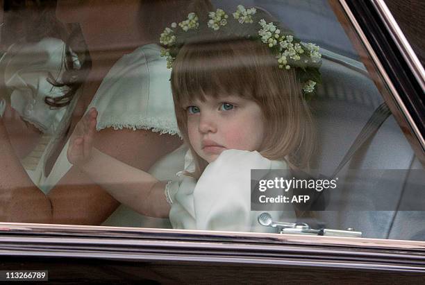 Bridesmaid Eliza Lopes, the granddaughter of the Duchess of Cornwall, leaves the Goring Hotel as they make their way to Westminster Abbey ahead of...