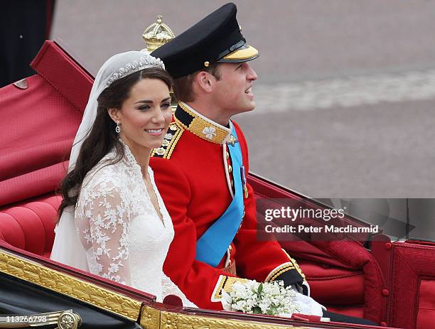 Their Royal Highnesses Prince William, Duke of Cambridge and Catherine, Duchess of Cambridge make the journey by carriage procession to Buckingham...