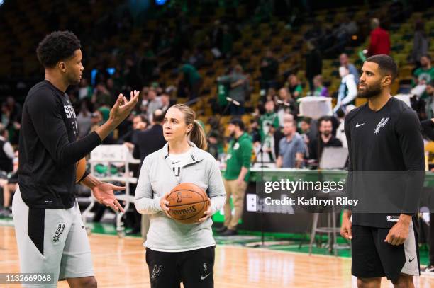 San Antonio Spurs assistant coach Becky Hammon works with Derrick White and Patty Mills during a pre-game shoot around before a game against the...