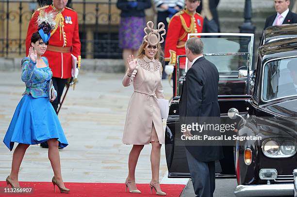 Princess Beatrice of York and Princess Eugenie of York prepare to make the journey by carriage procession to Buckingham Palace following the Royal...