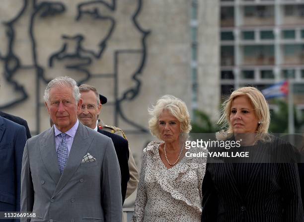 Britain's Prince Charles and his wife Camilla , accompanied by Cuba's Deputy Minister of Foreign Affairs Ana Teresita Gonzalez , attend the...