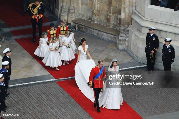 Their Royal Highnesses Prince William, Duke of Cambridge and Catherine, Duchess of Cambridge are followed by Maid of Honour Pippa Middleton, their...