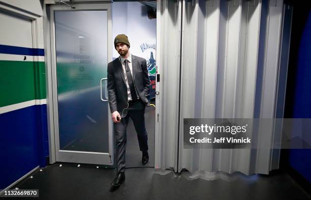 Adam McQuaid of the Columbus Blue Jackets walks to his dressing room before their NHL game against the Vancouver Canucks at Rogers Arena March 24,...