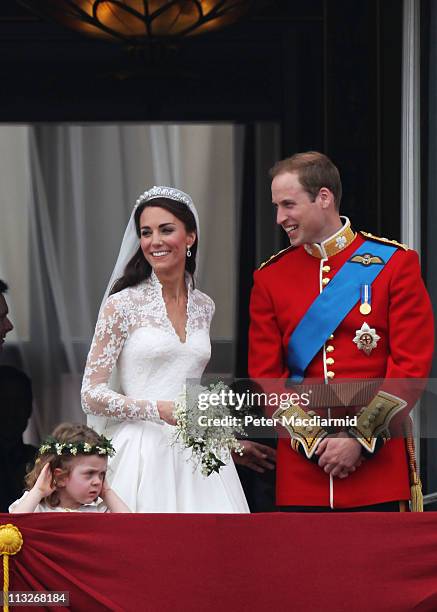 Their Royal Highnesses Prince William, Duke of Cambridge and Catherine, Duchess of Cambridge greet well-wishers from the balcony at Buckingham Palace...