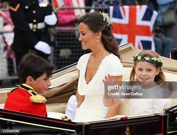 Sister of the Bride and Maid of Honour Pippa Middleton and bridesmaid Margarita Armstrong-Jones ride in a carriage procession to Buckingham Palace...