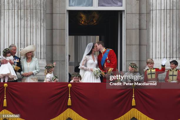 Their Royal Highnesses Prince William, Duke of Cambridge and Catherine, Duchess of Cambridge kiss on the balcony at Buckingham Palace on April 29,...