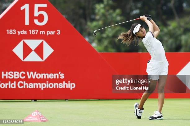 Muni He of China plays her shot from the 15th tee during the first round of the HSBC Women's World Championship at Sentosa Golf Club on February 28,...