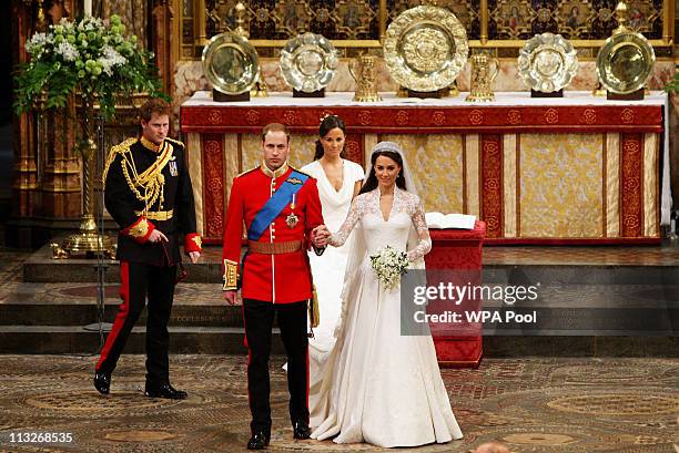 Prince William, Duke of Cambridge and Catherine, Duchess of Cambridge prepare to leave Westminster Abbey following their marriage ceremony, on April...