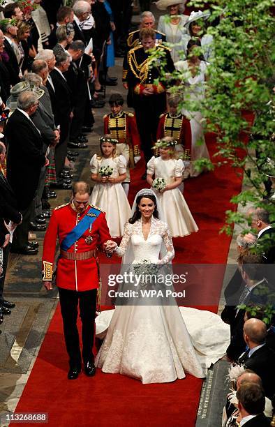 Prince William, Duke of Cambridge and Catherine, Duchess of Cambridge smile following their marriage at Westminster Abbey on April 29, 2011 in...