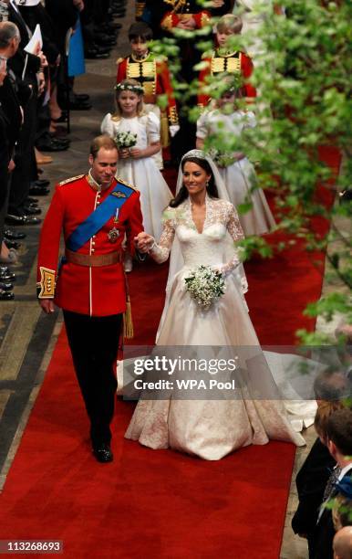 Prince William, Duke of Cambridge and Catherine, Duchess of Cambridge smile following their marriage at Westminster Abbey on April 29, 2011 in...