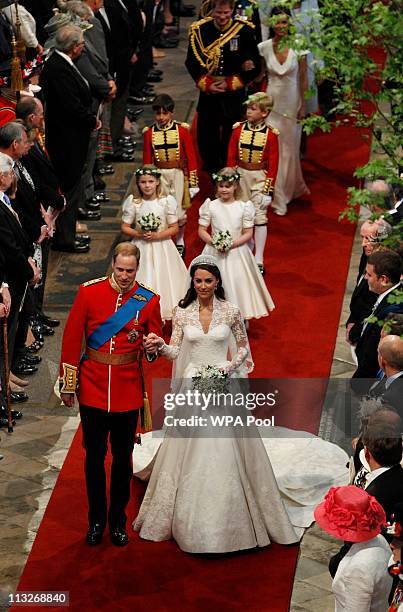 Prince William, Duke of Cambridge and Catherine, Duchess of Cambridge smile following their marriage at Westminster Abbey on April 29, 2011 in...