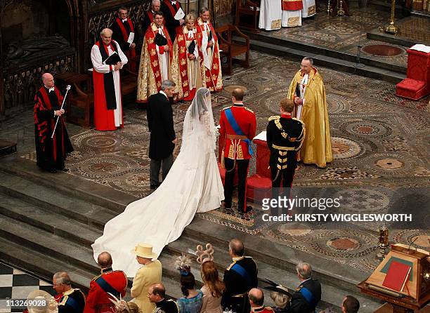 Michael Middleton, Kate Middleton's father, Kate Middleton, Britain's Prince William and Britain's Prince Harry attend the royal wedding at...