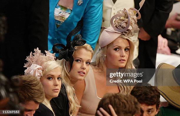 Earl Spencer's daughter's Lady Amelia, Lady Eliza and Lady Kitty sit together inside Westminster Abbey ahead of the Royal Wedding of Prince William...