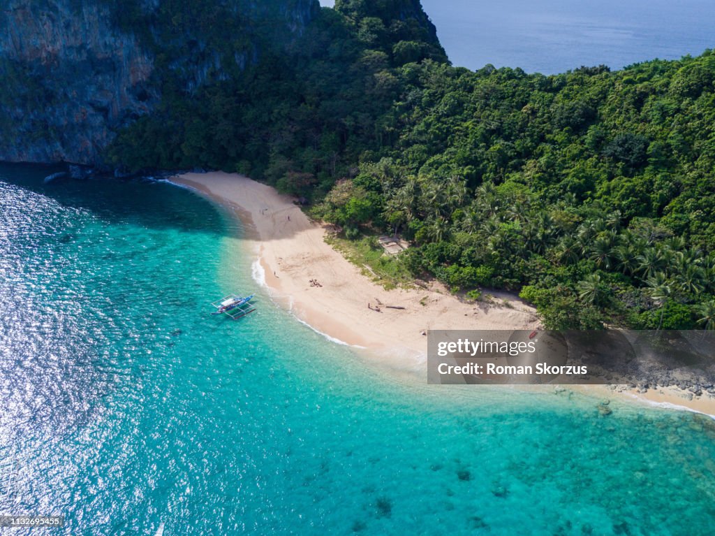 Aerial Drone Picture of the Limestone Island and White Sand Beach in El Nido, Palawan in the Philippines