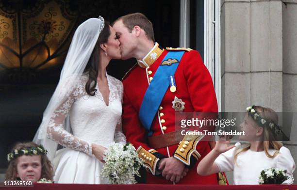 Their Royal Highnesses Prince William, Duke of Cambridge and Catherine, Duchess of Cambridge kiss on the balcony at Buckingham Palace on April 29,...