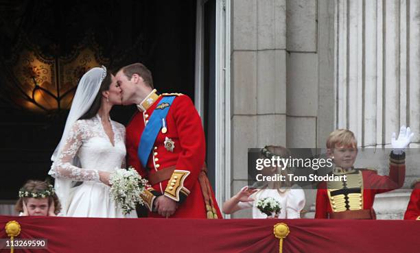 Their Royal Highnesses Prince William, Duke of Cambridge and Catherine, Duchess of Cambridge kiss on the balcony at Buckingham Palace on April 29,...