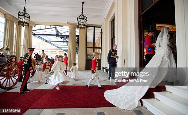 Prince William, Duke of Cambridge and Catherine, Duchess of Cambridge arrive at Buckingham Palace after their wedding at Westminster Abbey on April...