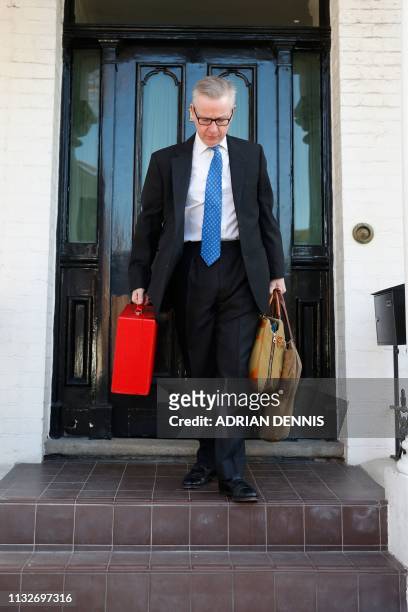 Britain's Environment, Food and Rural Affairs Secretary Michael Gove leaves his residence in west London on March 25, 2019. - British Prime Minister...