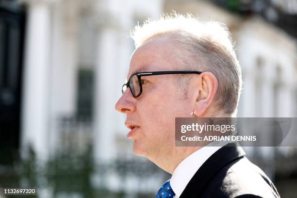 Britain's Environment, Food and Rural Affairs Secretary Michael Gove leaves his residence in west London on March 25, 2019. - British Prime Minister...