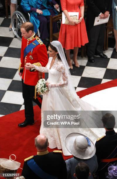 Prince William, Duke of Cambridge and his new bride Catherine, Duchess of Cambridge walk down the aisle at the close of their wedding ceremony at...