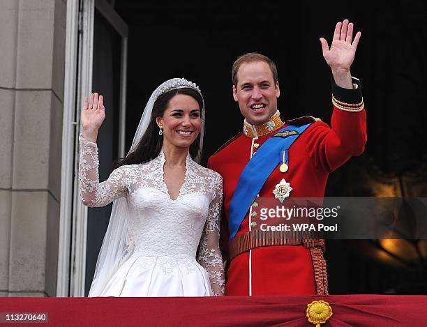 Their Royal Highnesses Prince William, Duke of Cambridge and Catherine, Duchess of Cambridge wave on the balcony at Buckingham Palace during the...