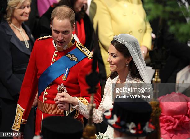 Prince William, Duke of Cambridge and Catherine, Duchess of Cambridge leave Westminster Abbey following their marriage ceremony, on April 29, 2011 in...