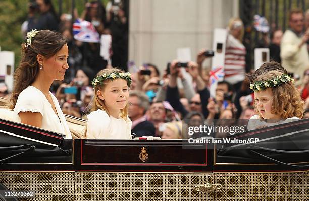 Sister of the bride and Maid of Honour Pippa Middleton with Bridesmaids Margarita Armstrong-Jones and Grace Van Cutsem ride in a carriage after the...