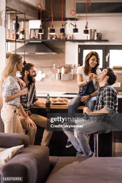 young happy couples having fun on a party at home. - double date stock pictures, royalty-free photos & images