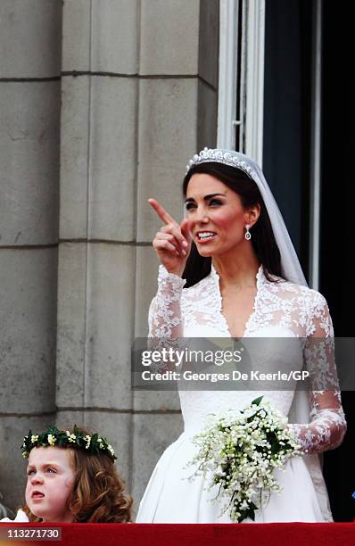 Catherine, Duchess of Cambridge and bridesmaid Grace Van Cutsem looks on from the balcony at Buckingham Palace on April 29, 2011 in London, England....