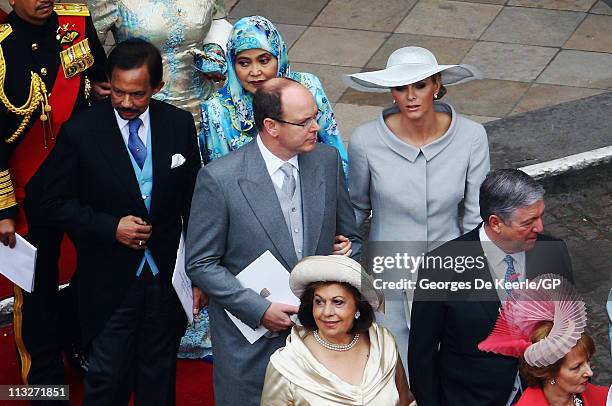 Brunei's Sultan Hassanal Bolkiah, Prince Albert of Monaco and his fiancee Charlene Wittstock leave Westminster Abbery following the Royal Wedding of...