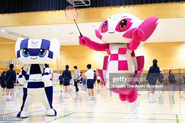 Tokyo 2020 Olympic and Paralympic Games mascots Miraitowa and Someity play badminton during the event marking the unveiling of the Tokyo 2020 mascots...