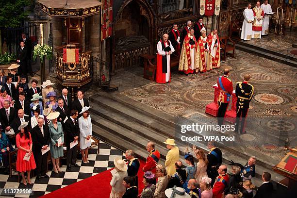 Prince William, Duke of Cambridge and Prince Harry wait for the arrival of Catherine Middleton in Westminster Abbey on April 29, 2011 in London,...