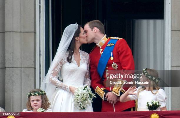 Prince William, Duke of Cambridge and Catherine, Duchess of Cambridge stand on the balcony of Buckingham Palace after getting married on April 29,...