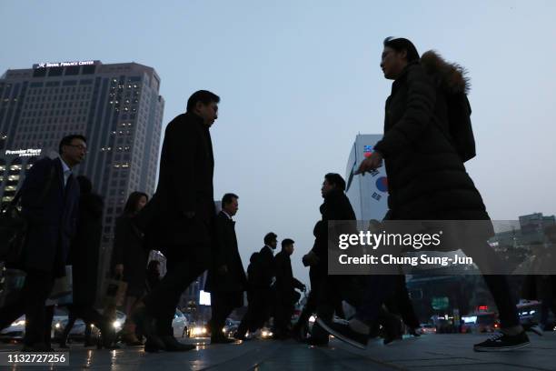 Pedestrians walk in downtown on February 28, 2019 in Seoul, South Korea. U.S President Donald Trump and North Korean leader Kim Jong-un abruptly cut...