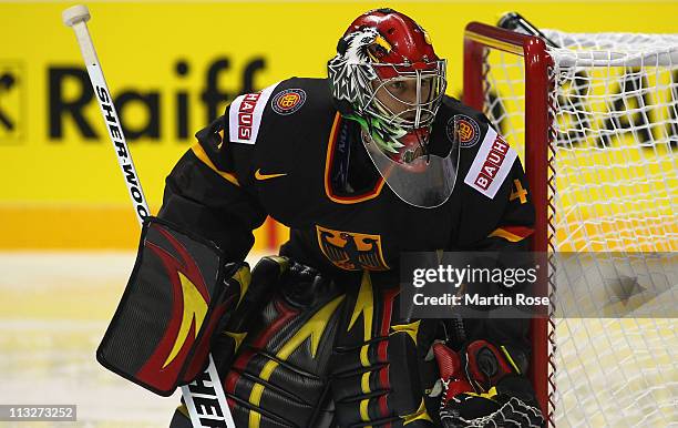 Dennis Endras, goaltender of Germany awaits the puck the IIHF World Championship group A match between Germany and Russia at Orange Arena on April...