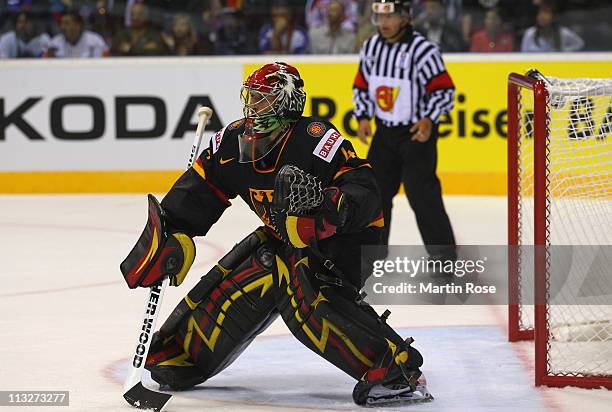 Dennis Endras, goaltender of Germany awaits the puck the IIHF World Championship group A match between Germany and Russia at Orange Arena on April...