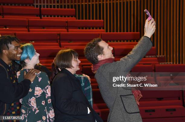 Benedict Cumberbatch poses with drama students after welcoming the new LAMDA Director, Sarah Frankcom, at LAMDA on February 28, 2019 in London,...