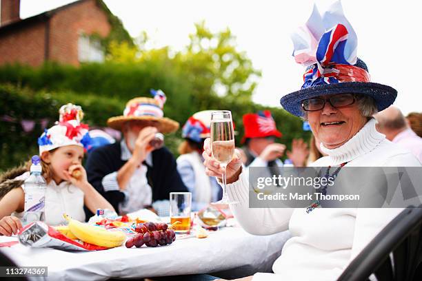 Local residents of the village of Yardley Hastings Northamptonshire celebrate the royal wedding with a street party on on April 29, 2011 in...