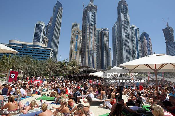 British expatriates gather to watch a live broadcast of the royal wedding of Britain's Prince William and Kate Middleton in the Gulf emirate of Dubai...