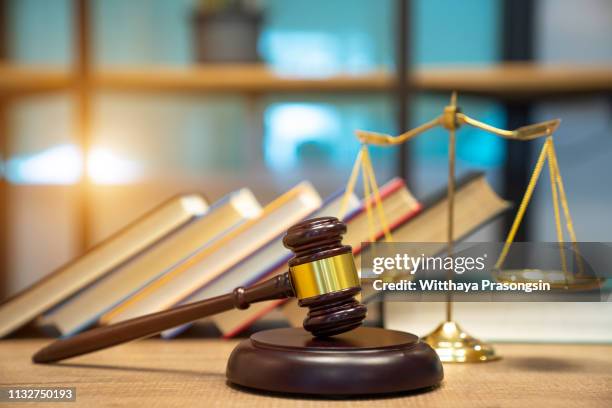 legal office of lawyers and attorney. judge gavel, scale of justice - judge gavel stock pictures, royalty-free photos & images