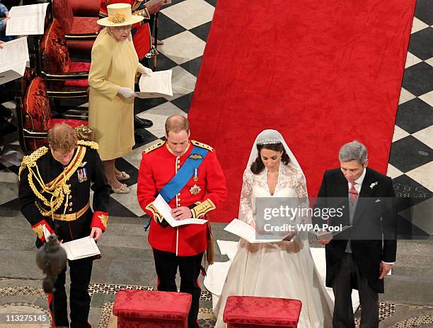 Prince Harry, Prince William Duke of Cambridge, Catherine Duchess of Cambridge and Michael Middleton inside Westminster Abbey on April 29, 2011 in...