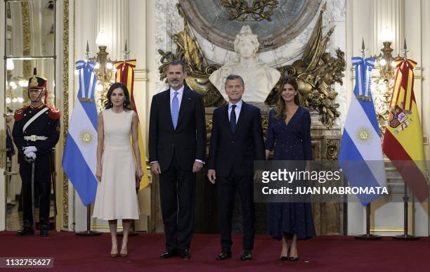 Spain's King Felipe VI , his wife Queen Letizia , Argentina's President Mauricio Macri and his wife First Lady Juliana Awada pose for pictures during...