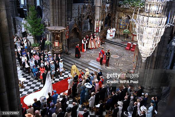 Prince William, Duke of Cambridge and Prince Harry wait for the arrival of Catherine Middleton in Westminster Abbey on April 29, 2011 in London,...