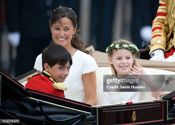 Pippa Middleton with William Lowther-Pinkerton and Margarita Armstrong-Jones depart the marriage of Their Royal Highnesses Prince William Duke of...