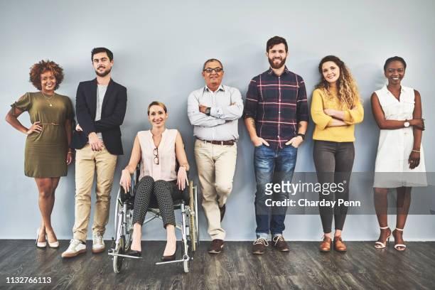 we're all qualified! - wheelchair stock pictures, royalty-free photos & images