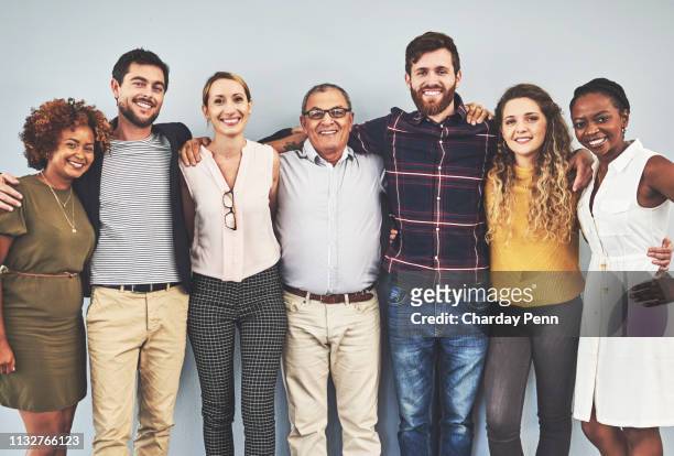as a team, nothing can defeat us - organized group photo stock pictures, royalty-free photos & images