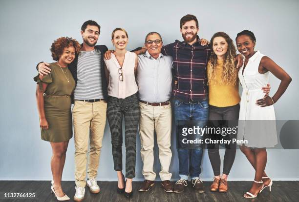 unity is what wins challenges - organized group photo stock pictures, royalty-free photos & images